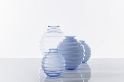 Deco Vase by Venini | Rhythm defines the shape with repeated rings that increase, decrease, and move like ripples in water. Available in matte or glossy, opale or transparent finishes | Designer: Napoleone Martinuzzi | Home Decor Vases | 2Jour Concierge, your luxury lifestyle shop