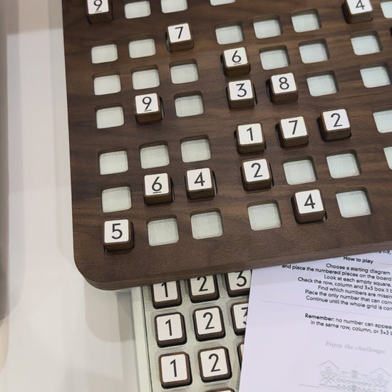 Giobagnara | Delos Sudoku Game Set Wood: Walnut or wengé board with 81 wood playing pieces and digital-printed leather inserts | Game Room | 2Jour Concierge, your luxury lifestyle shop | luxury sudoku wood, Giobagnara Delos, walnut sudoku board, Italian designer puzzle