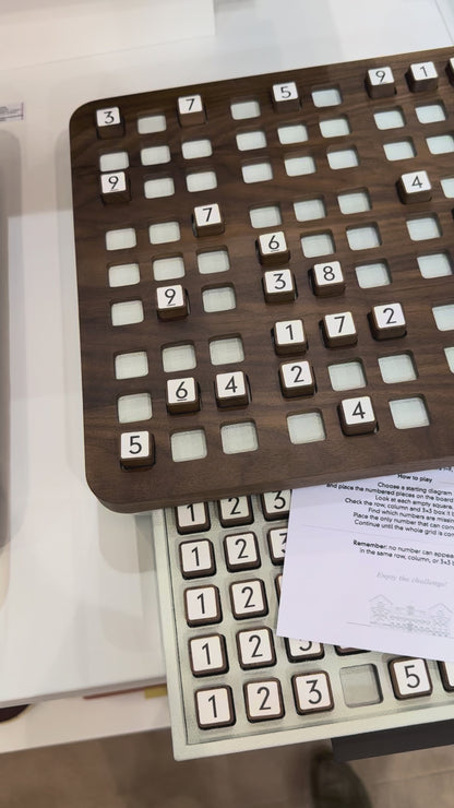 Giobagnara | Delos Sudoku Game Set Wood: Walnut or wengé board with 81 wood playing pieces and digital-printed leather inserts | Game Room | 2Jour Concierge, your luxury lifestyle shop | luxury sudoku wood, Giobagnara Delos, walnut sudoku board, Italian designer puzzle