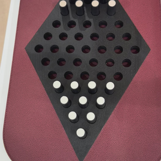 Giobagnara | Delos Chinese Checkers Set: Leather-covered board with playing pieces in wood, marble, or Corian® | Game Room | 2Jour Concierge, your luxury lifestyle shop | luxury chinese checkers, Giobagnara Delos, leather game set, Italian designer board game