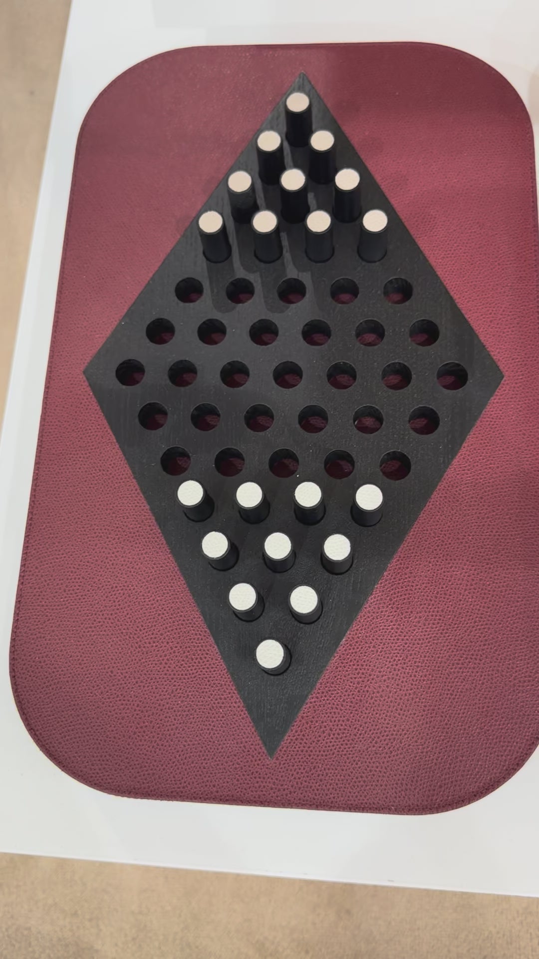 Giobagnara | Delos Chinese Checkers Set: Leather-covered board with playing pieces in wood, marble, or Corian® | Game Room | 2Jour Concierge, your luxury lifestyle shop | luxury chinese checkers, Giobagnara Delos, leather game set, Italian designer board game