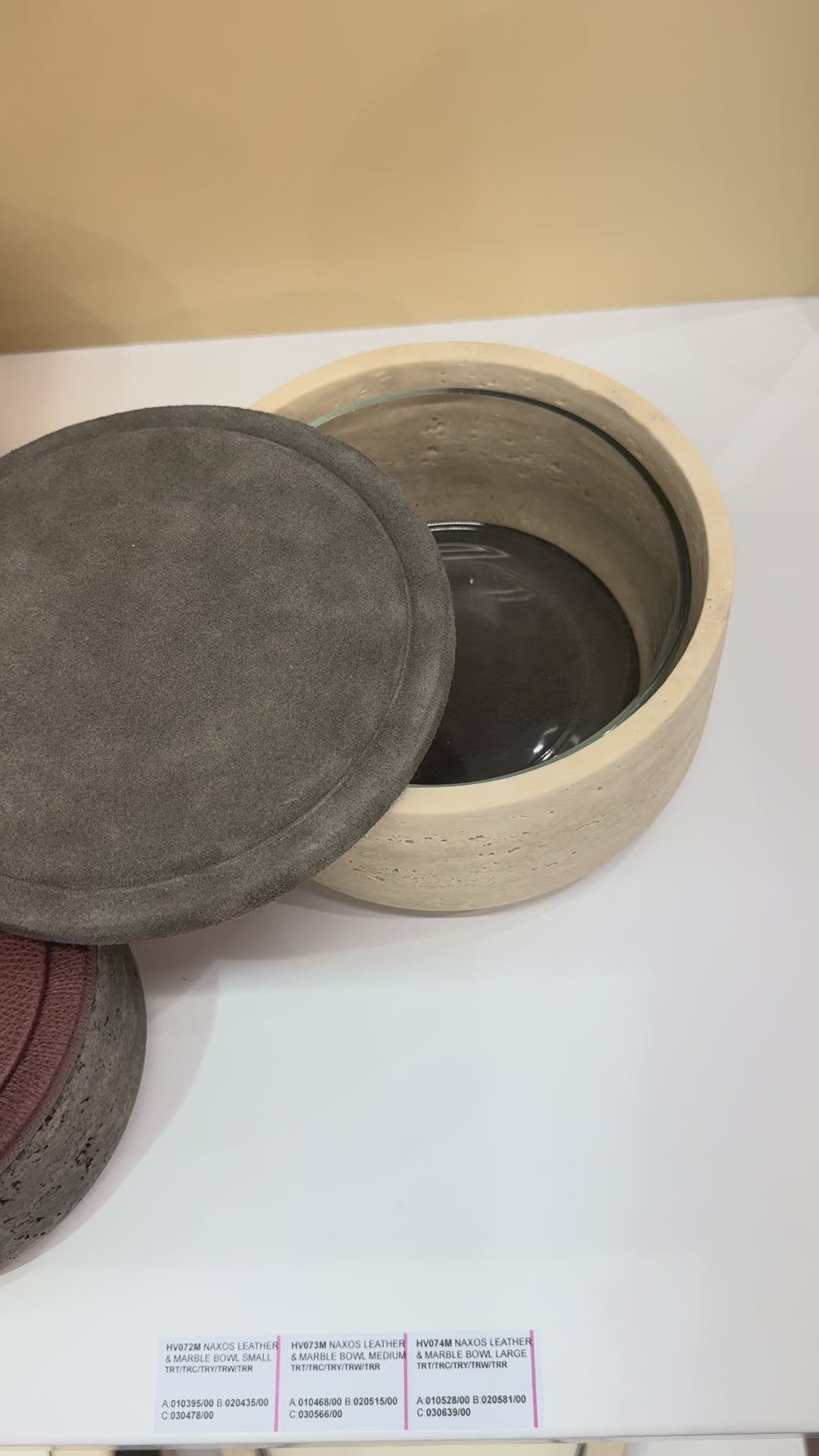 Giobagnara | Naxos Leather & Marble Bowl: Travertine marble bowl with leather-covered lid in multiple sizes | Decor / Trinket Boxes | 2Jour Concierge, your luxury lifestyle shop | luxury decorative storage, premium stone objects for expensive interiors, bedside tables, desks, and curated shelving